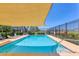 Inviting community pool with ample seating, perfect for relaxing and enjoying the sunshine at 115 64Th E Ave, Bradenton, FL 34203