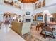 Elegant living room boasting a fireplace, high ceilings, comfortable seating, and abundant natural light at 1216 N Casey Key Rd, Osprey, FL 34229