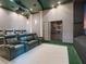 Theater room featuring comfortable seating, a projector, and professional soundproofing at 1216 N Casey Key Rd, Osprey, FL 34229