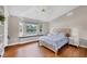 Comfortable bedroom with a bay window and seating area at 1355 Debrecen Rd, Sarasota, FL 34240