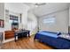 Bedroom featuring a vaulted ceiling, a music nook with a piano, and a cozy atmosphere at 1355 Debrecen Rd, Sarasota, FL 34240