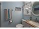 Bathroom with textured blue walls and light countertop at 1416 41St E Ave, Ellenton, FL 34222