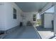 Covered carport provides shade and protection with a serene view of the outdoors at 1416 41St E Ave, Ellenton, FL 34222