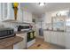 Efficient kitchen with white appliances and laminate countertops, offering ample space at 1416 41St E Ave, Ellenton, FL 34222
