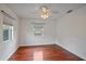 Bedroom featuring hardwood floors, neutral walls, and a window with bright, natural light at 1507 30Th W St, Bradenton, FL 34205