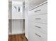 Walk-in closet with built-in storage solutions, maximizing space and organization at 1575 Eastbrook Dr, Sarasota, FL 34231