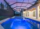 A dazzling screened pool with ample space for lounging and a spectacular sunset view at 1575 Eastbrook Dr, Sarasota, FL 34231