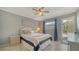 Light, airy bedroom with a ceiling fan and bright natural lighting at 1711 Southwood St # 1711, Sarasota, FL 34231