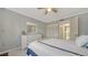 Well-decorated bedroom featuring light walls, carpeted floors, and matching furniture at 1711 Southwood St # 1711, Sarasota, FL 34231