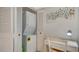 This in-unit laundry set-up features a stacked washer and dryer, coupled with a small desk area at 1711 Southwood St # 1711, Sarasota, FL 34231