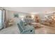Stylish living room with a relaxing seating area and a dining space for entertaining at 1711 Southwood St # 1711, Sarasota, FL 34231