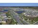 Expansive aerial view of a well-planned community with homes, ponds, and landscaped streets under a clear blue sky at 177 Tierra Verde Way, Bradenton, FL 34212