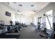 Well-equipped gym with modern fitness machines, ceiling fans, and ample lighting for a complete workout experience at 177 Tierra Verde Way, Bradenton, FL 34212