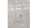 Hallway with a front door, white walls, and a tiled floor at 177 Tierra Verde Way, Bradenton, FL 34212