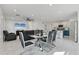 Open-concept living space with dining area, modern kitchen, and comfortable seating at 177 Tierra Verde Way, Bradenton, FL 34212