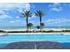 Resort pool with stunning beachfront views and access to the white sand beach at 1800 Benjamin Franklin Dr # B208, Sarasota, FL 34236