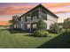 Beautiful two-story home featuring a screened-in porch and manicured landscaping at 18117 Gawthrop Dr # 101, Lakewood Ranch, FL 34211