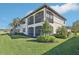 Stunning rear exterior featuring a screened lanai, perfect for outdoor living at 18117 Gawthrop Dr # 101, Lakewood Ranch, FL 34211