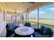 Spacious lanai with comfortable seating and scenic views of the surrounding landscape at 18117 Gawthrop Dr # 101, Lakewood Ranch, FL 34211
