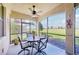 Inviting screened lanai with a lovely view of the lush golf course at 18117 Gawthrop Dr # 101, Lakewood Ranch, FL 34211