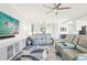 Spacious living room with contemporary decor and an open layout, perfect for modern living at 18117 Gawthrop Dr # 101, Lakewood Ranch, FL 34211