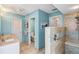 Bathroom featuring a double vanity, shower with tile accent, and tile floor at 1878 Killdeer Ct, Venice, FL 34293