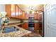 Bright kitchen showcases stainless steel appliances, granite countertops, ample storage, and modern fixtures at 20186 Benissimo Dr, Venice, FL 34293