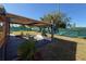 Open back porch with tiled flooring and a view of the expansive, fenced-in backyard at 22332 Midway Blvd, Port Charlotte, FL 33952