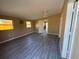 Spacious bedroom featuring luxury vinyl flooring, neutral paint, and ample natural light at 22332 Midway Blvd, Port Charlotte, FL 33952