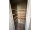A walk-in pantry with tiled floors and multiple shelves for ample storage at 22332 Midway Blvd, Port Charlotte, FL 33952