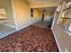 Tiled sunroom leading to the living area offers an inviting space with natural light at 22332 Midway Blvd, Port Charlotte, FL 33952