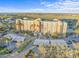 Aerial view of a luxurious highrise condo with covered parking and beautiful landscaping at 2320 Terra Ceia Bay Blvd # 206, Palmetto, FL 34221