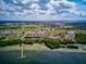 Waterfront community aerial view with a pier and lush surroundings at 2320 Terra Ceia Bay Blvd # 206, Palmetto, FL 34221