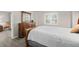Bedroom featuring wood floors, a large window, and a spacious closet at 2320 Terra Ceia Bay Blvd # 206, Palmetto, FL 34221