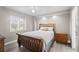 Bedroom with hardwood floors, a ceiling fan, and a sunlit window at 2320 Terra Ceia Bay Blvd # 206, Palmetto, FL 34221