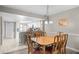 Dining room featuring a wood table, and chair set, with views of the kitchen at 2320 Terra Ceia Bay Blvd # 206, Palmetto, FL 34221