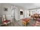 Open living room featuring wood floors, neutral walls, and doorway to bathroom at 2320 Terra Ceia Bay Blvd # 206, Palmetto, FL 34221