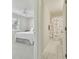 View of bathroom and bedroom featuring ceiling fan, shower and bed at 2412 15Th W St, Palmetto, FL 34221