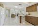 Open layout featuring kitchen, dining, and living spaces at 2412 15Th W St, Palmetto, FL 34221