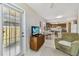 Open floor plan with living area, adjacent dining area and kitchen, providing seamless flow at 2412 15Th W St, Palmetto, FL 34221