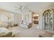 Open-concept living area leading to the kitchen, featuring neutral colors and comfortable seating at 2412 15Th W St, Palmetto, FL 34221