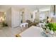 Bright open-concept living space with dining area and view into the living area at 2412 15Th W St, Palmetto, FL 34221