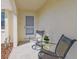 Cozy front porch with seating area, perfect for relaxing and enjoying the outdoors at 2412 15Th W St, Palmetto, FL 34221