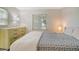 Bedroom with neutral tones, stylish flooring, and lots of natural light at 3108 Lake Bayshore Dr # 211, Bradenton, FL 34205