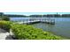 Community waterfront featuring a fishing pier that extends out onto the lake at 3108 Lake Bayshore Dr # 211, Bradenton, FL 34205