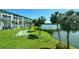 Community grounds with shuffleboard and scenic water views at 3108 Lake Bayshore Dr # 211, Bradenton, FL 34205