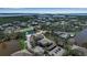 Aerial view of waterfront community with pool and tennis court at 318 108Th St W # 318, Bradenton, FL 34209