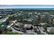 Scenic aerial shot of waterfront condo community with pool and tennis at 318 108Th St W # 318, Bradenton, FL 34209