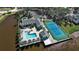 Community amenities featuring a pool, waterfront views, and a tennis court, all in one place at 318 108Th St W # 318, Bradenton, FL 34209