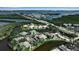 Aerial view of waterfront community and nearby roadways at 318 108Th St W # 318, Bradenton, FL 34209